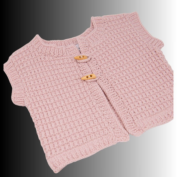 Baby Strickweste aus Bio-Merinowolle – weich, zeitlos & handgemacht