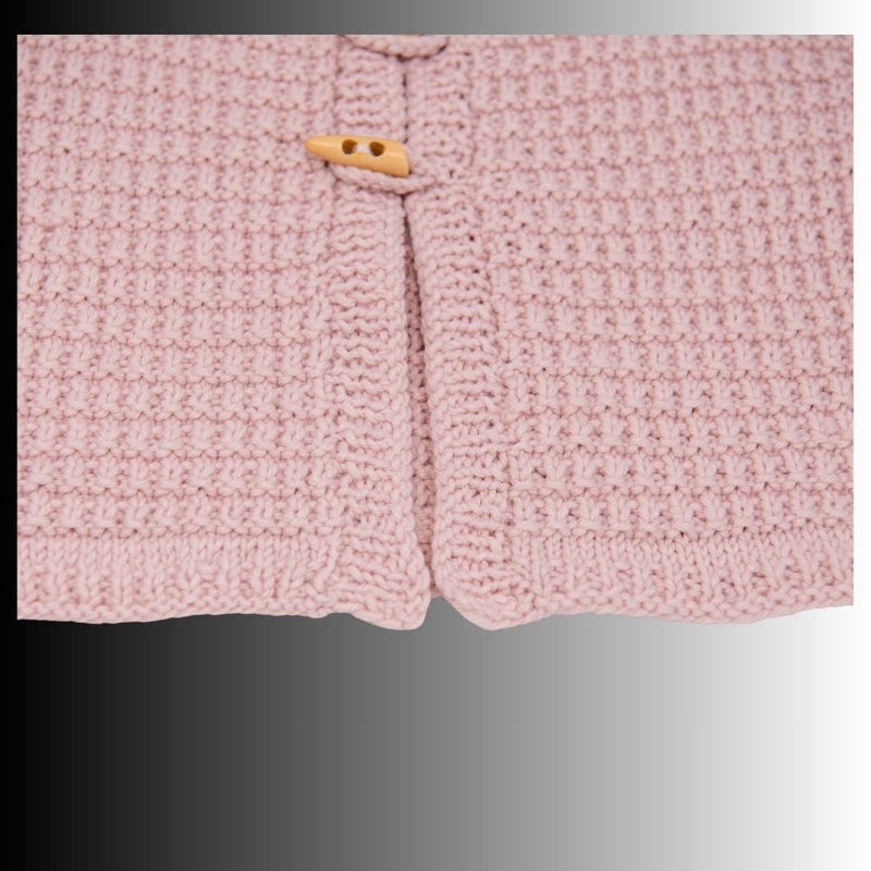 Baby Strickweste aus Bio-Merinowolle – weich, zeitlos & handgemacht